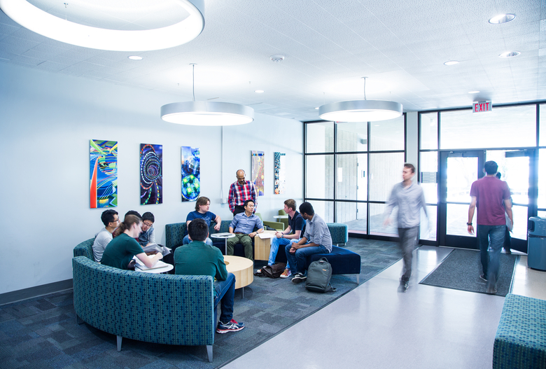 students gathered in lobby of enginerring building